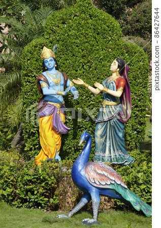 Radha and Krishna idols in different poses in garden of Nilkanthdham, Swaminarayan temple, Poicha, Gujarat, Radha and Krishna idols in different poses in garden of Nilkanthdham, Swaminarayan temple, Poicha, Gujarat, 86427644