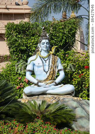 Lord Shiva as Yogi in Dhyana Mudra in garden of Nilkanthdham, Swaminarayan temple, Poicha, Gujarat, Lord Shiva as Yogi in Dhyana Mudra in garden of Nilkanthdham, Swaminarayan temple, Poicha, Gujarat, 86427646
