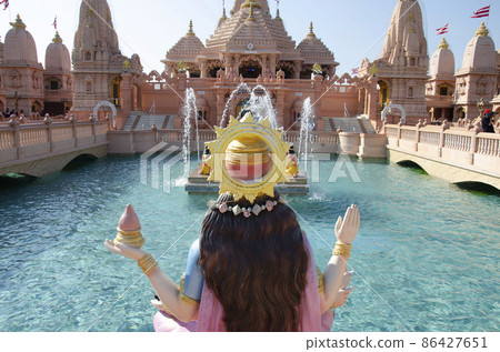Goddess Narmada overseeing the Neelkanth Sarovar, artificial pond and Sandstone mandaps, Neelkanth Dham Swaminarayan Temple, Poicha, Gujarat, India, located at Poicha, Gujarat, India Goddess Narmada overseeing the Neelkanth Sarovar, artificial pond and Sandstone mandaps, Neelkanth Dham Swaminarayan Temple, Poicha, Gujarat, India, located at Poicha, Gujarat, India 86427651