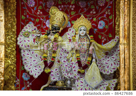 Radha and Krishna idols inside the Swaminarayan temple at Nilkanthdham, Poicha, Gujarat, India 86427686
