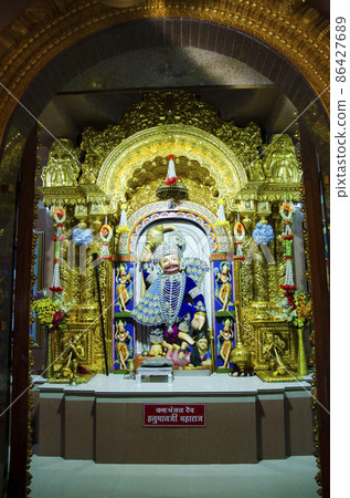 Lord Hanuman idol inside the temple at Swaminarayan temple, Nilkanthdham, Poicha, Gujarat, India 86427689