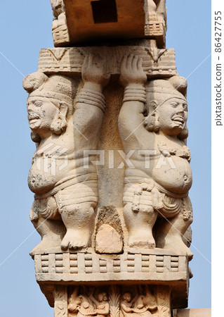 Stupa No 1, West Gateway, Pillars capitals showing Dwarfs holding pillars. World Heritage Site, Sanchi, Madhya Pradesh, India Stupa No 1, West Gateway, Pillars capitals showing Dwarfs holding pillars. World Heritage Site, Sanchi, Madhya Pradesh, India 86427755
