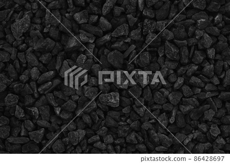 Natural pebble rock pattern for background, black and grey gravel stone texture. Natural pebble rock pattern for background, black and grey gravel stone texture. 86428697