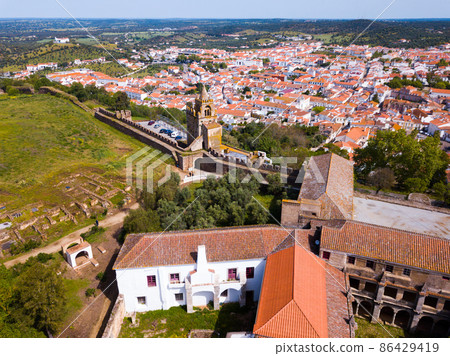 Panoramic view from drone of the castle Montemor o Novo. The Alcaides palace ruins. Evora district. Alentejo,  86429419