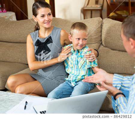 Woman answer questions of social employee Woman answer questions of social employee 86429812