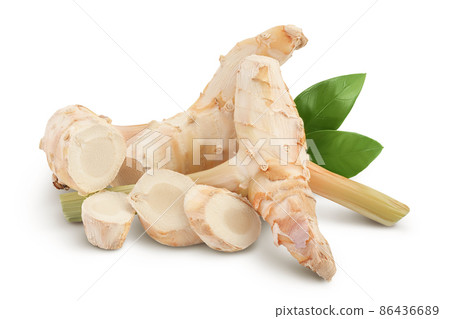 Fresh galangal root with slices isolated on white background with clipping path and full depth of field. Fresh galangal root with slices isolated on white background with clipping path and full depth of field. 86436689
