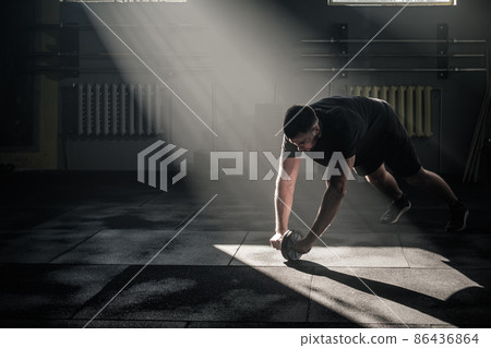 Focused Male Train Arms Muscles in Gym Club . Focused Male Train Arms Muscles in Gym Club . 86436864