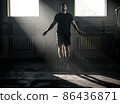 Athletic Male Jump With Skipping Rope . 86436871