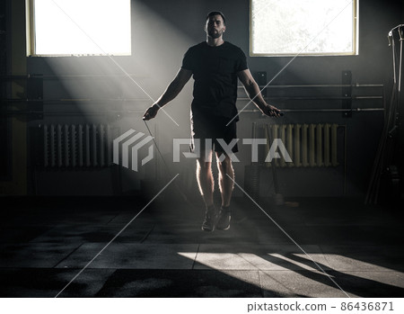 Athletic Male Jump With Skipping Rope . Athletic Male Jump With Skipping Rope . 86436871