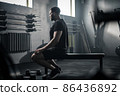 Sportsman Take Pause After Workout With Dumbbells . 86436892