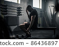 Male Take Break After Workout With Dumbbells . 86436897