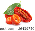 Dried or Sundried tomato halves with chile pepper and basil  isolated 86439750