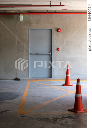 The fire exit door for the emergency case of the parking building. 86440014