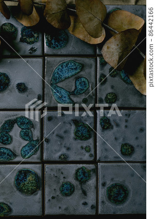 Dark black textured ceramic tiles abstract background 86442166