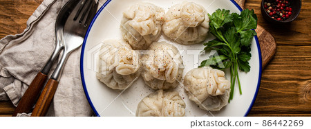 Khinkali, traditional dish of Georgian Caucasian cuisine, dumplings filled with ground meat 86442269