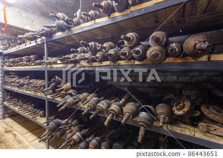 Used car parts on the factory shelf. Used car parts on the factory shelf. 86443651