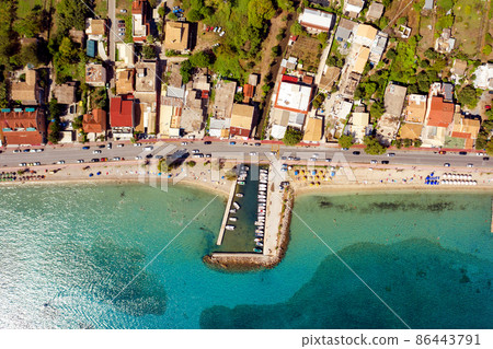 Aerial of mediterranean beach in Greece 86443791