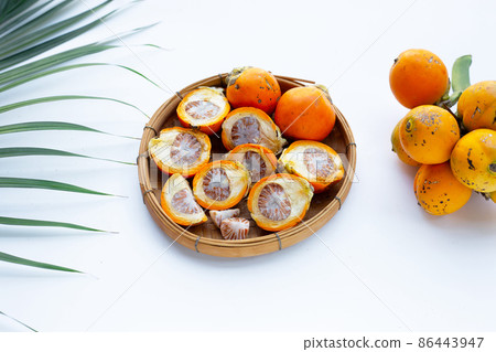 Betel nut in bamboo basket Betel nut in bamboo basket 86443947