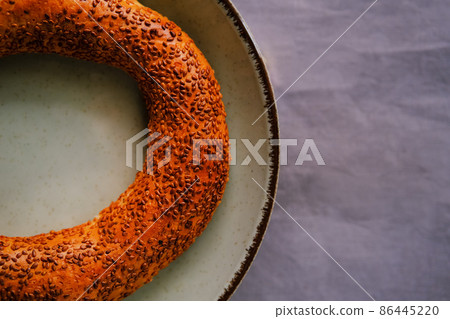 Traditional Turkish bagel pastry simit ,gevrek and fermented beverage ayran. 86445220