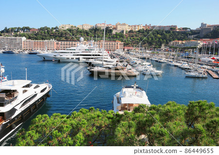 Rich yachts in the bay at evening time. Monaco. 86449655