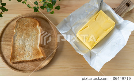 Butter and toast 86449719