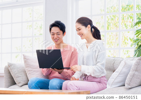 Housewife begging for a laptop screen Housewife begging for a laptop screen 86450151