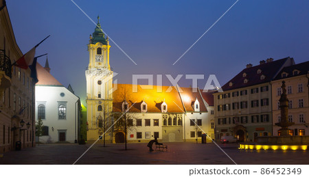 Main Square in old historic city Bratislava illuminated at dusk 86452349