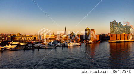 Wonderful view over Hamburg harbour and the Elbphilharmonie Concert Hall at sunset 86452578
