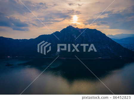 Aerial view over the Lake Lugano in Switzerland - evening view 86452823
