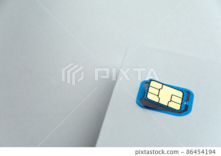 Close-up image of sim card white background Close-up image of sim card white background 86454194