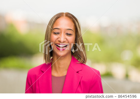 south African businesswoman CEO Headshot in blurry background. Millennial woman entrepreneur 86454596