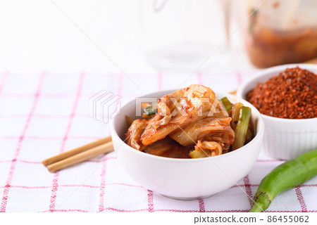 Kimchi cabbage in a bowl, Korean homemade fermented side dish food Kimchi cabbage in a bowl, Korean homemade fermented side dish food 86455062