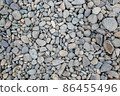 Riverbank gravel, stone and rock patterns, natural background material 86455496