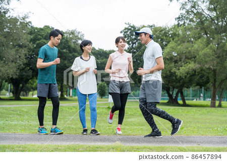 Young men and women enjoying sports Young men and women enjoying sports 86457894