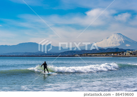 Chigasaki coast surfing surfer silhouette Mt. Fuji 86459600