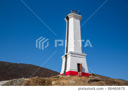 Lighthouse (leading beacon) on the sea coast 86460670