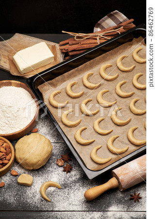 Baking tray with traditional German or Austrian Vanillekipferl vanilla kipferl cookies Baking tray with traditional German or Austrian Vanillekipferl vanilla kipferl cookies 86462769