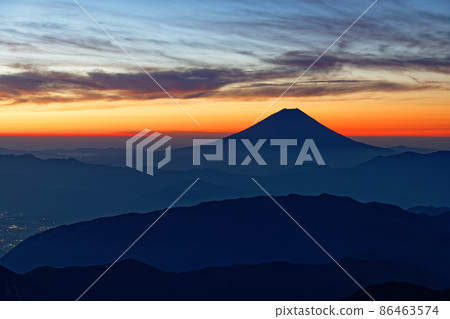Mt. Fuji at dawn seen from the summit of Mt. Kitadake in the Southern Alps 86463574