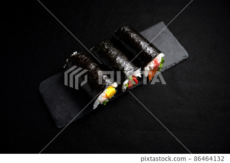 Setsubun eats handmade seafood Ehomaki facing auspicious directions Setsubun eats handmade seafood Ehomaki facing auspicious directions 86464132