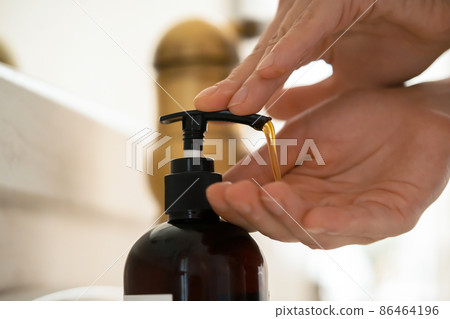 Girl washes her hands with soap. Girl washes her hands with soap. 86464196