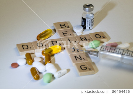 Concept of doping. Pills and syringes. Beijing olympics. Concept of doping. Pills and syringes. Beijing olympics. 86464436