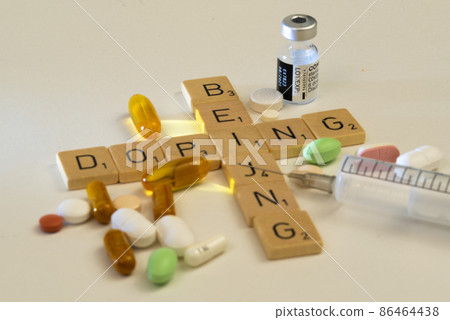 Concept of doping. Pills and syringes. Beijing olympics. Concept of doping. Pills and syringes. Beijing olympics. 86464438