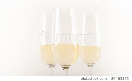 Luxurious champagne in a glass, festive way of celebrating a new year or important events, toast with sparkling wine 86465365