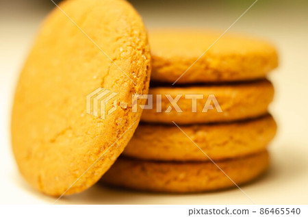 Close up on a stack of cinnamon oat cookies on a white background 86465540