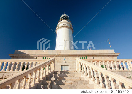 Lighthouse on Cap de Formentor on island Majorca, Balaeric Islands, Spain. Lighthouse on Cap de Formentor on island Majorca, Balaeric Islands, Spain. 86465740