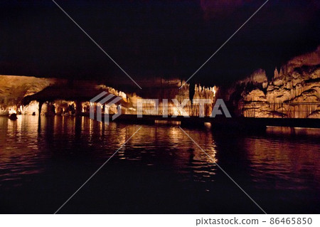 Incide the dragon caves with underground lake on island Majorca, Spain. Incide the dragon caves with underground lake on island Majorca, Spain. 86465850