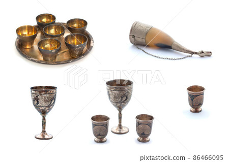 Collage of silver wineglasses on white 86466095
