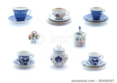 Collage of porcelain tea cups and dishes with flower ornament 86466097