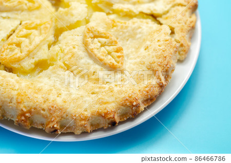 Traditional apple pie, Bramley apple filling in shortcrust pastry, topped with demerara sugar glaze 86466786