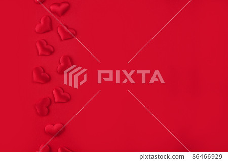 Festive St. Valentines background with red hearts on red background with copy space. St.Valentines day background for your project 86466929